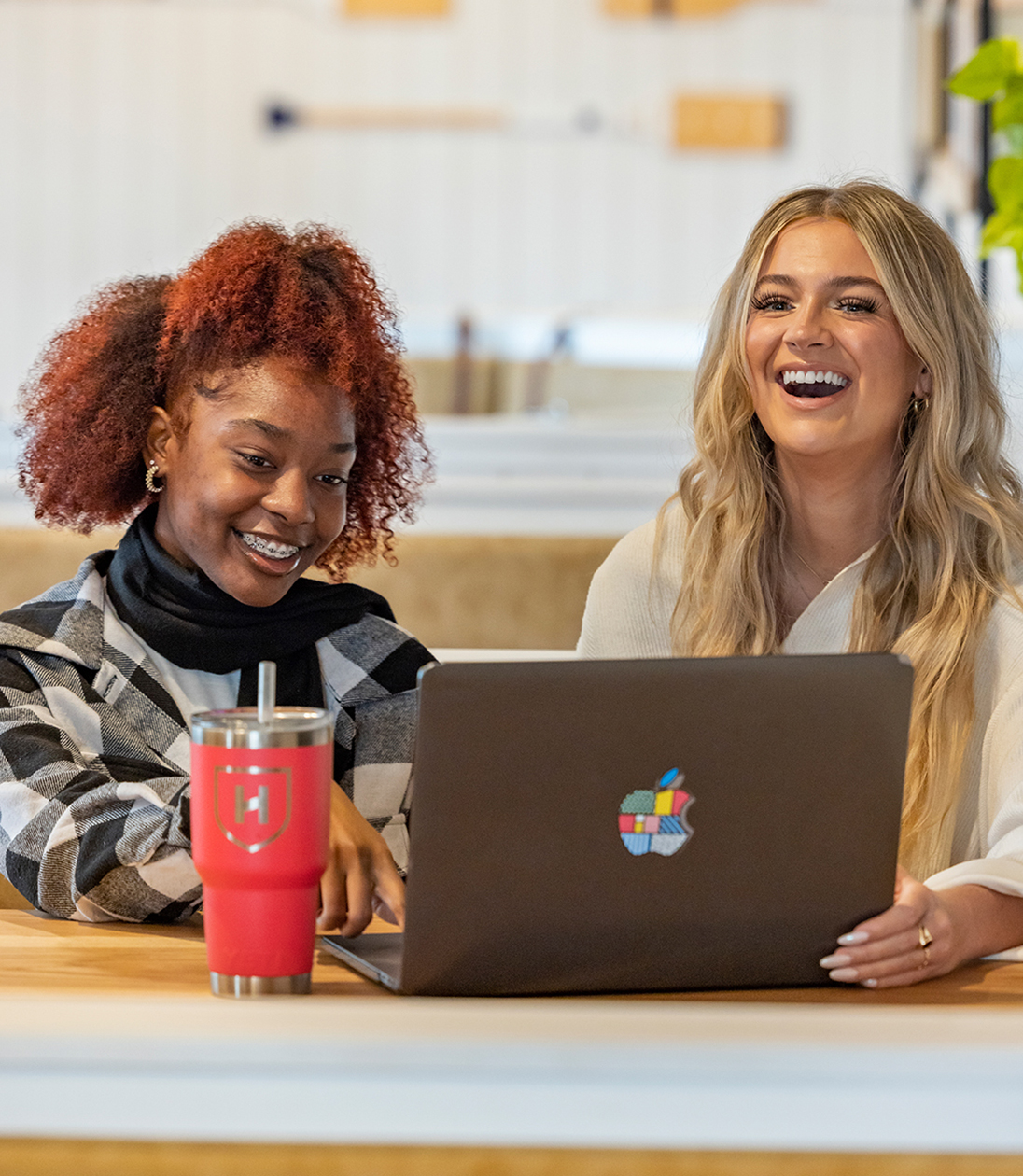 Two women studying together